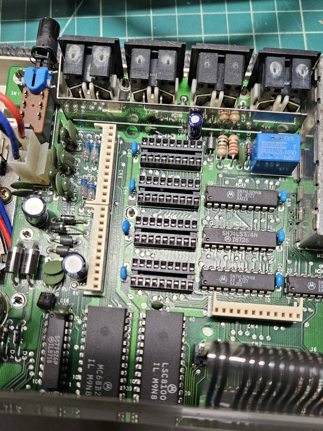 The Color Computer 3 main board with its four memory chip sockets empty