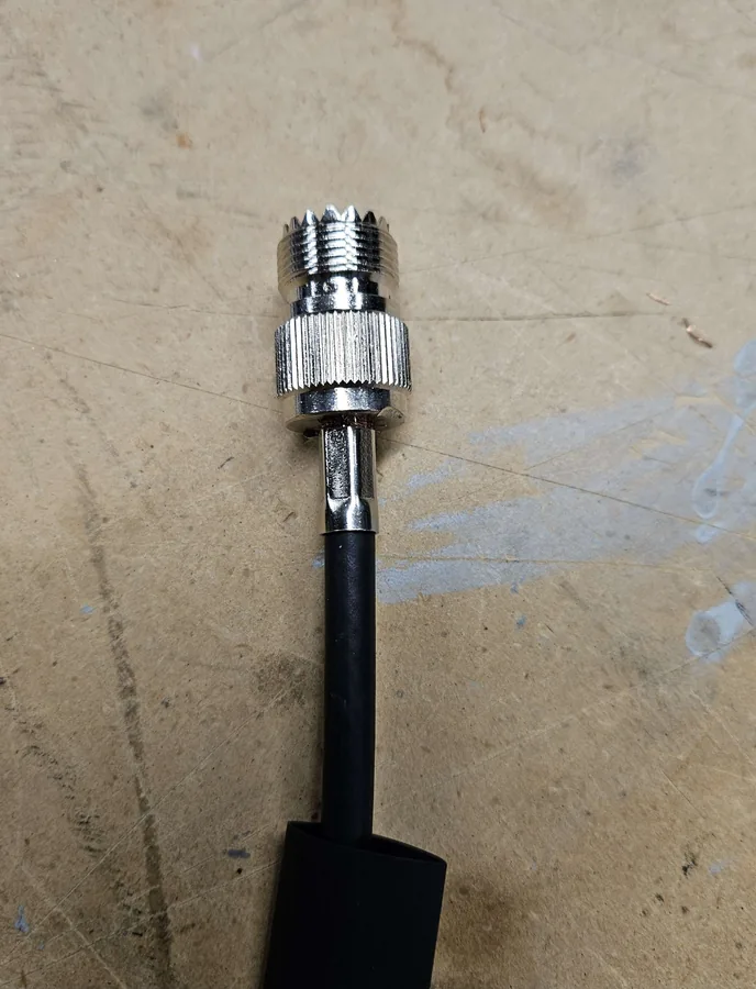 The UHF connector soldered onto the end of the coax
